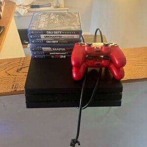 Sony PlayStation 4 Console with Red DualShock Controller